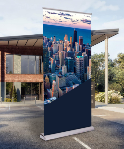 roll-up banner with full colour print standing in front of the building