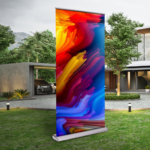 roll-up banner premium with full colour print standing in front of the building on the lawn